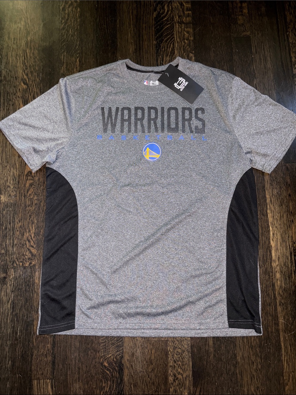 NBA Gray Warriors Short Sleeve Performance Tee with Black Panels and Blue Logo